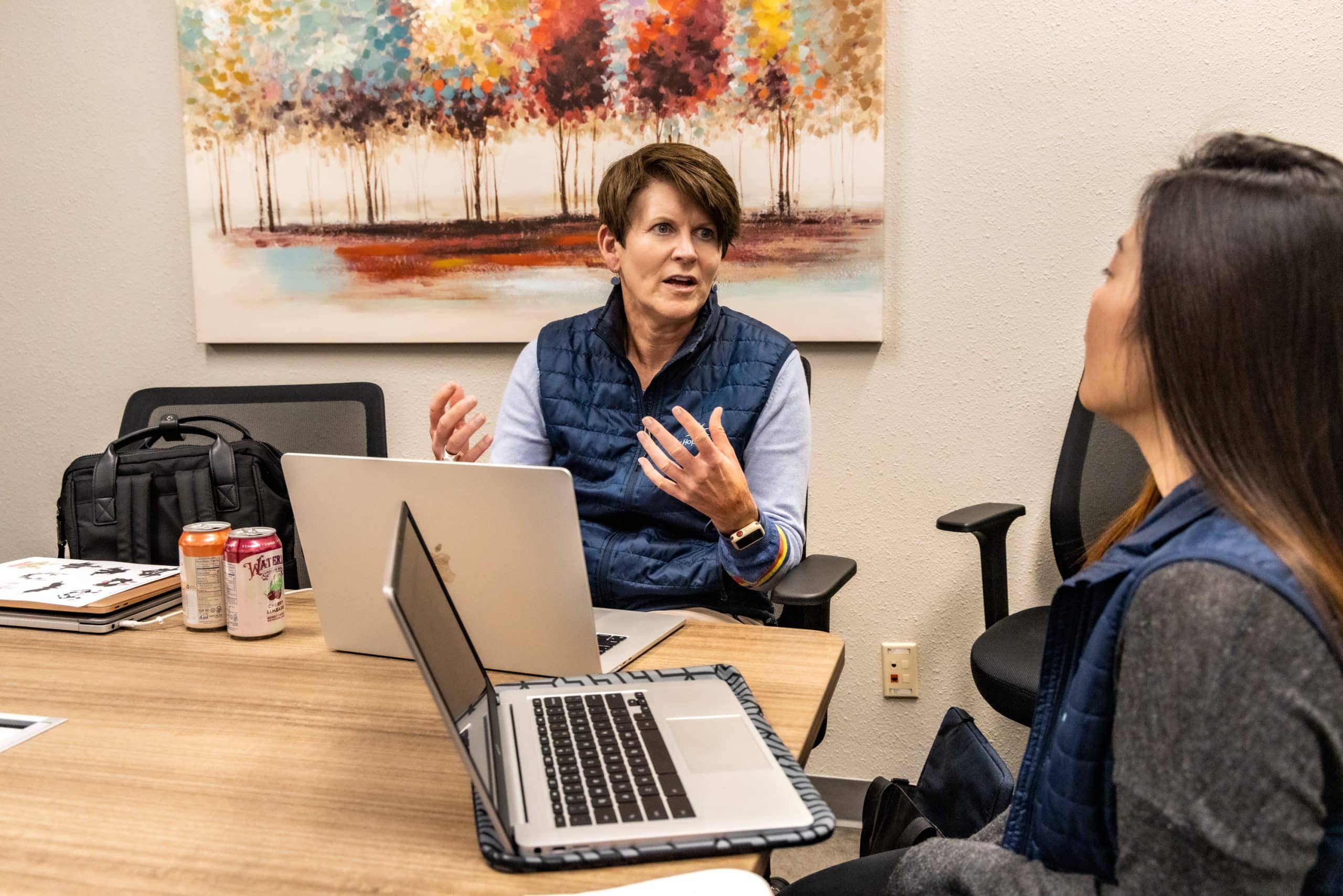 Your Hope Center Executive Director Carrie Benway speaks with the manager of the nonprofit’s mobile crisis program, Jennifer Kim, whose team dispatches specially trained mental health professionals to respond to emergencies alongside paramedics and law enforcement across Eagle County.